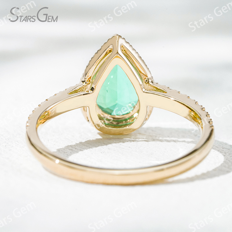 7×10​mm Pear Cut Lab Grown Emerald 18K Yellow Gold Halo Engagement Ring