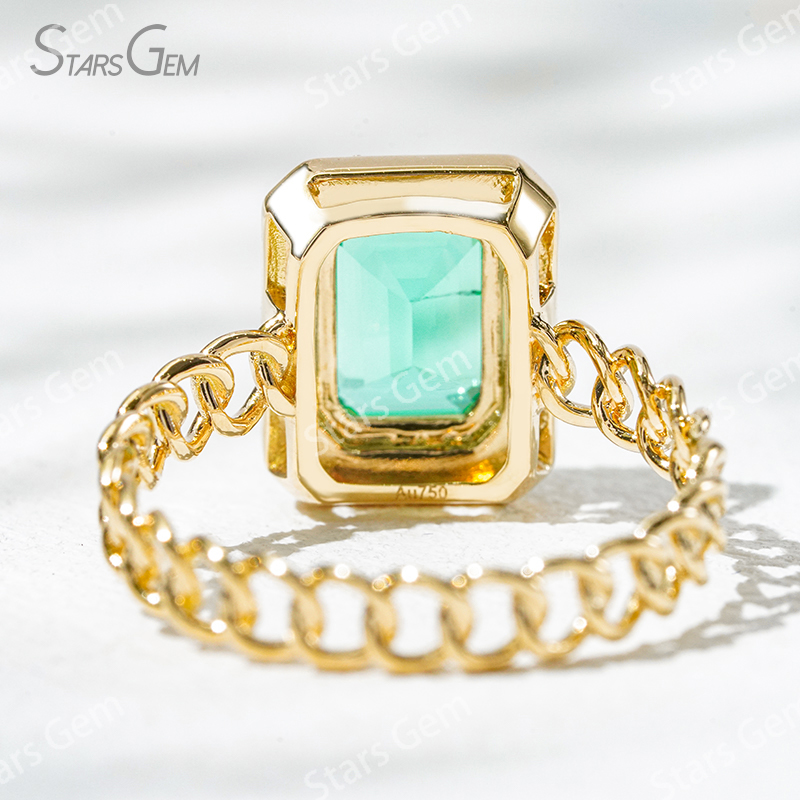 6×8mm Octagon Emerald Cut Lab Grown Emerald 18K Yellow Gold Halo Engagement Ring