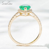 7×10​mm Pear Cut Lab Grown Emerald 18K Yellow Gold Halo Engagement Ring