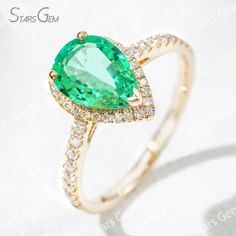 7×10​mm Pear Cut Lab Grown Emerald 18K Yellow Gold Halo Engagement Ring