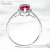 6×9​mm Pear Cut Lab Gemstones 18K Gold Halo Engagement Ring
