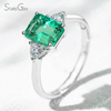 6×8mm Octagon Emerald Cut Lab Grown Emerald 18K Gold Three Stone Engagement Ring