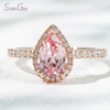 6×9​mm Pear Cut Lab Gemstones 18K Gold Halo Engagement Ring