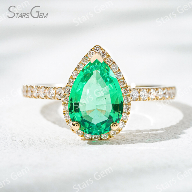 7×10​mm Pear Cut Lab Grown Emerald 18K Yellow Gold Halo Engagement Ring