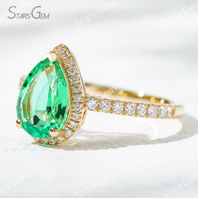 7×10​mm Pear Cut Lab Grown Emerald 18K Yellow Gold Halo Engagement Ring