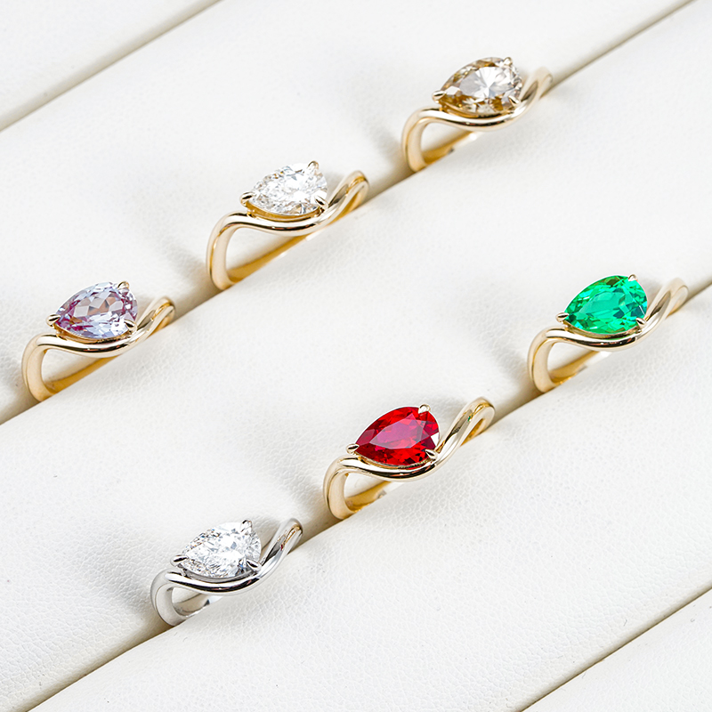 Structural architecture and prong design for modern diamond engagement rings